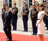 Carla Bruni et Nicolas Sarkozy à Caen lors des cérémonies du 65e anniversaire du débarquement allié en Normandie, le 6 juin 2009