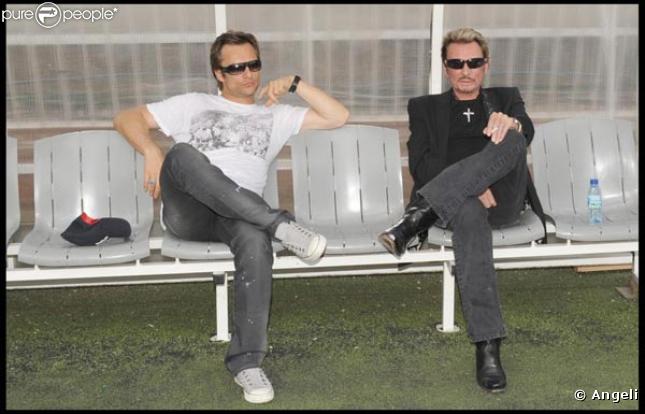 David et Johnny Hallyday, lors du match de football en faveur de deux associations humanitaires (et de ses 66 ans), au Parc des Princes, le 14 juin 2009 !