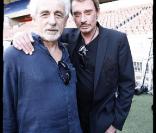 Johnny Hallyday et Daniel Angeli, lors du match de football en faveur de deux associations humanitaires (et de ses 66 ans), au Parc des Princes, le 14 juin 2009 !
