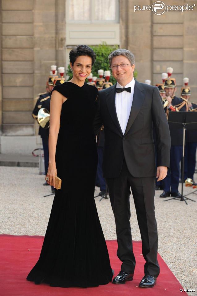 Le top Farida Khelfa et son époux Henri Seydoux arrivent à l'Elysée, le 22 juin 2009.