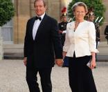 Michele Alliot-Marie et son époux Patrick Ollier sont ravis de participer au dîner d'Etat de l'Elysée du 22 juin 2009.