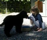 La famille princière de Norvège avec leur nouveau chien Milly Kakao le 28 juin 2009 à Oslo : Ingrid Alexandra 