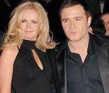 Shane Filan, de Westlife, et sa femme Gillian Walsh (au centre, à gauche) attendent leur troisième enfant