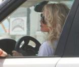 Pamela Anderson sur la plage de Malibu... Un brin nostalgique Pam ?