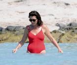 Cécilia Attias passe ses vacances à Ibiza, loin de tout, en compagnie de son mari Richard et de son fils Louis, 12 ans, né de son mariage avec Nicolas Sarkozy. Juillet 2009