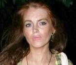 Lindsay Lohan de sortie le 25 juillet 2009, elle charge et décharge sa voiture avant d'aller passer son samedi soir en boîte à Hollywood
