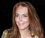 Lindsay Lohan de sortie le 25 juillet 2009, elle charge et décharge sa voiture avant d'aller passer son samedi soir en boîte à Hollywood