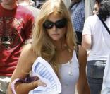 Denise Richards, son père et ses deux filles Lola et Sam (Malibu, 2 août 2009)