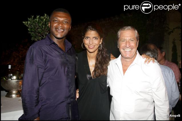 Marcel Desailly, Hoda Roche et Jean-Claude Darmon lors de la soirée des Vendanges du Désert, au domaine de Bertaud-Belieu, le 27 août 2009
