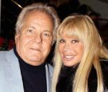 Massimo Gargia et Lova Moore, à l'occasion des 32 ans de la marque de haute-fourrure Sam-Rone, au Sam-Rone's Space, à Paris, le 14 octobre 2009 !