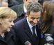 Mais qu'est-ce que Carla est en train de raconter à notre Président ? En tout cas, ça a l'air de lui plaire ! 