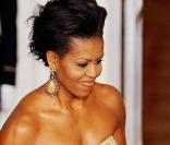 Michelle Obama à Washington le 24/11/09, superbement moulée dans une robe signée Naeem Khan 