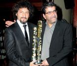 Radu Mihaileanu et Norbert Saada lors de la remise du prix Cinéma Patrimoine de Paris, le 5 décembre à l'Automobile Club de France, à Paris.