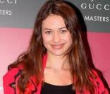 Olga Kurylenko à la soirée Gucci Masters le 13/12/09 à Villepinte