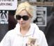 Ashley Tisdale : elle brave la pluie pour s'offrir... une petite douceur !