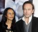 Vincent Perez et Karine Sylla à l'occasion de l'avant-première de  From Paris with Love , à l'UGC Normandie, sur les Champs-Elysées, à Paris, le 11 février 2010.