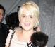 La métamorphose de Kelly Osbourne : En février 2010, Kelly se rend à la Fashion Week avec sa petite boule de poil et sa silhouette de starlette... Elle est à croquer !