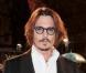 Quand Johnny Depp joue à l'homme-invisible... C'est raté ! Il vient d'arriver à Venise pour rejoindre Angelina...