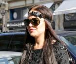 Lindsay Lohan rentre à son hôtel parisien après avoir assisté à un défilé, lors de la Fashion Week, samedi 6 mars.