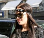 Lindsay Lohan rentre à son hôtel parisien après avoir assisté à un défilé, lors de la Fashion Week, samedi 6 mars.