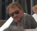 Johnny Hallyday et Laeticia à Saint-Barthélémy, le 16 mars 2010, à la plage Eden Rock.