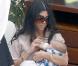 Kourtney Kardashian et son fils Mason à Miami le 13 mars 2010