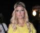 Bandeau ravissant, cheveux bien coiffés et micro-robe jaune, l'héritière Paris Hilton avait opté pour un look hippie-sexy-chic qui lui allait à ravir.