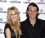 Carlos Moya et sa compagne Caroline Cerezuela à la Luxurious Lexus party à Madrid, le 11 mai 2010 