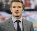 David Beckham assistait, renfrogné, au match nul de l'équipe d'Angleterre face à l'Algérie en Coupe du monde, le 18 juin 2010.
