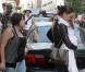 Katie Holmes porte sa petite Suri Cruise dans les bras, accompagnée de sa belle-fille Isabella. Elles quittent leur hôtel pour se rendre à un shooting le 22 juin 2010 à New York