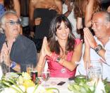 Flavio Briatore, Elisabetta Gregoraci et Fawaz Gruosi à l'occasion d'une fête donnée par Flavio Briatore à Porto Cervo, en Sardaigne, le 31 juillet 2010.