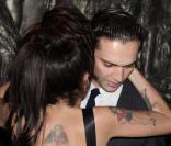 Amy Winehouse et son boyfriend Reg Traviss à l'inauguration du restaurant Shaka Zulu, à Londres, le 4 août 2010