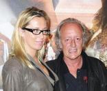 Didier Barbelivien et sa compagne enceinte de jumelles lors de la présentation du film Ces amours-là à Paris le 12 septembre 2010