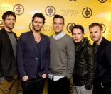 Robbie Williams et les Take That, à Londres le 26 octobre 2010 