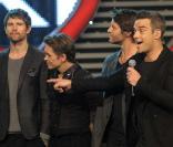 Les Take That au grand compet sur le plateau de  X Factor  Italie, à Milan, le 23 novembre 2010