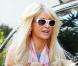 Paris Hilton ne cache plus ses rondeurs... Ces clichés l'illustrant avec ses chihuahuas à Los Angeles, le dimanche 23 janvier, font quasiment office de preuve.