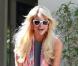 Paris Hilton ne cache plus ses rondeurs... Ces clichés l'illustrant avec ses chihuahuas à Los Angeles, le dimanche 23 janvier, font quasiment office de preuve.