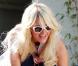 Paris Hilton ne cache plus ses rondeurs... Ces clichés l'illustrant avec ses chihuahuas à Los Angeles, le dimanche 23 janvier, font quasiment office de preuve.