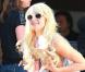 Paris Hilton ne cache plus ses rondeurs... Ces clichés l'illustrant avec ses chihuahuas à Los Angeles, le dimanche 23 janvier, font quasiment office de preuve.