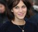 Alexa Chung arrive au défilé Burberry Prorsum à la Fashion Week de Londres, le 21 février 2011.