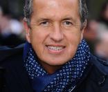 Mario Testino arrive au défilé Burberry Prorsum à la Fashion Week de Londres, le 21 février 2011.