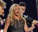 Britney Spears se produit sur la plateau du  Jimmy Kimmel Show  pour promouvoir son album Femme Fatale, mardi 29 mars.