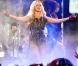 Britney Spears se produit sur la plateau du  Jimmy Kimmel Show  pour promouvoir son album Femme Fatale, mardi 29 mars.