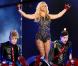 Britney Spears se produit sur la plateau du  Jimmy Kimmel Show  pour promouvoir son album Femme Fatale, mardi 29 mars.