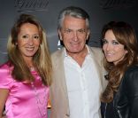 Le producteur Gilbert Coullier entouré de sa femme Nicole et Hélène Ségara à l'occasion de la présentation de la Fiat 500byGucci, au MotorVillage, à Paris, le 4 mai 2011.