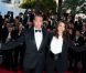 Bérénice Bejo et Jean Dujardin complices lors de la projection de The Artist, le 15 mai 2011, à Cannes.