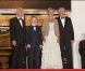 Les frères Jean-Luc et Pierre Dardenne, Cécile de France et le jeune Thomas Doret lors de la présentation au festival de Cannes du Gamin au vélo le 15 mai 2011 
