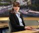 Carla Bruni-Sarkozy dévoile son ventre arrondi au JT de 13h de TF1, le 16 mai 2011.