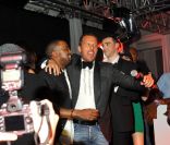Jean-Roch pose aux côtés de Kanye West, au VIP Room de Cannes, lors du Festival de Cannes 2011.
