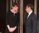 Carla-Bruni Sarkozy (enceinte) et son époux Nicolas Sarkozy sur le perron du Ciro's, à Deauville, le 26 mai 2011.